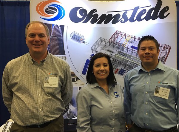Mark Biar of Ohmstede welcomes Leslie Ordonez of BIC Magazine and Ronnie Harris of Ohmstede at PMIES Expo