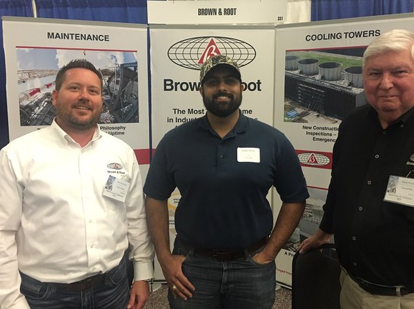 Occidental Petroleum visits Brown &amp; Root’s booth at the PMIES Expo