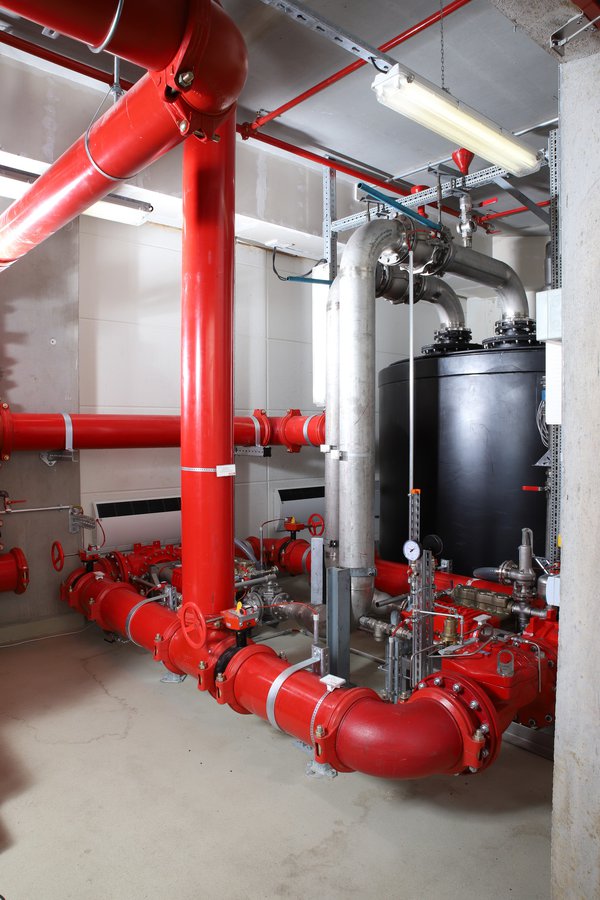 Cleaning fire extinguishing systems that have been contaminated by fluorine foam agents